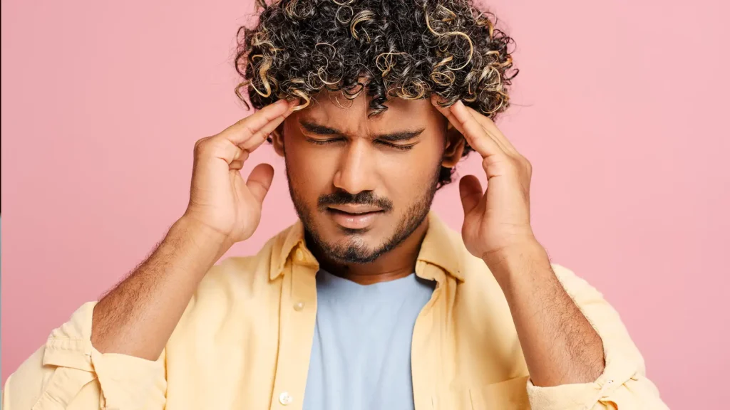man stressed headache