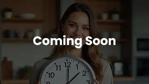 woman holding clock in kitchen 480 soon